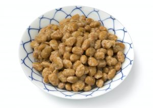 Bowl with traditional Japanese fermented soybeans called natto