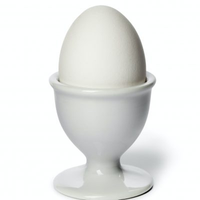 Boiled white egg in an eggcup