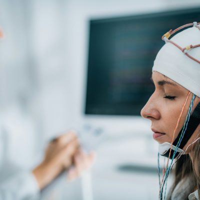 Female Patient in a Neurology Lab doing EEG Scan